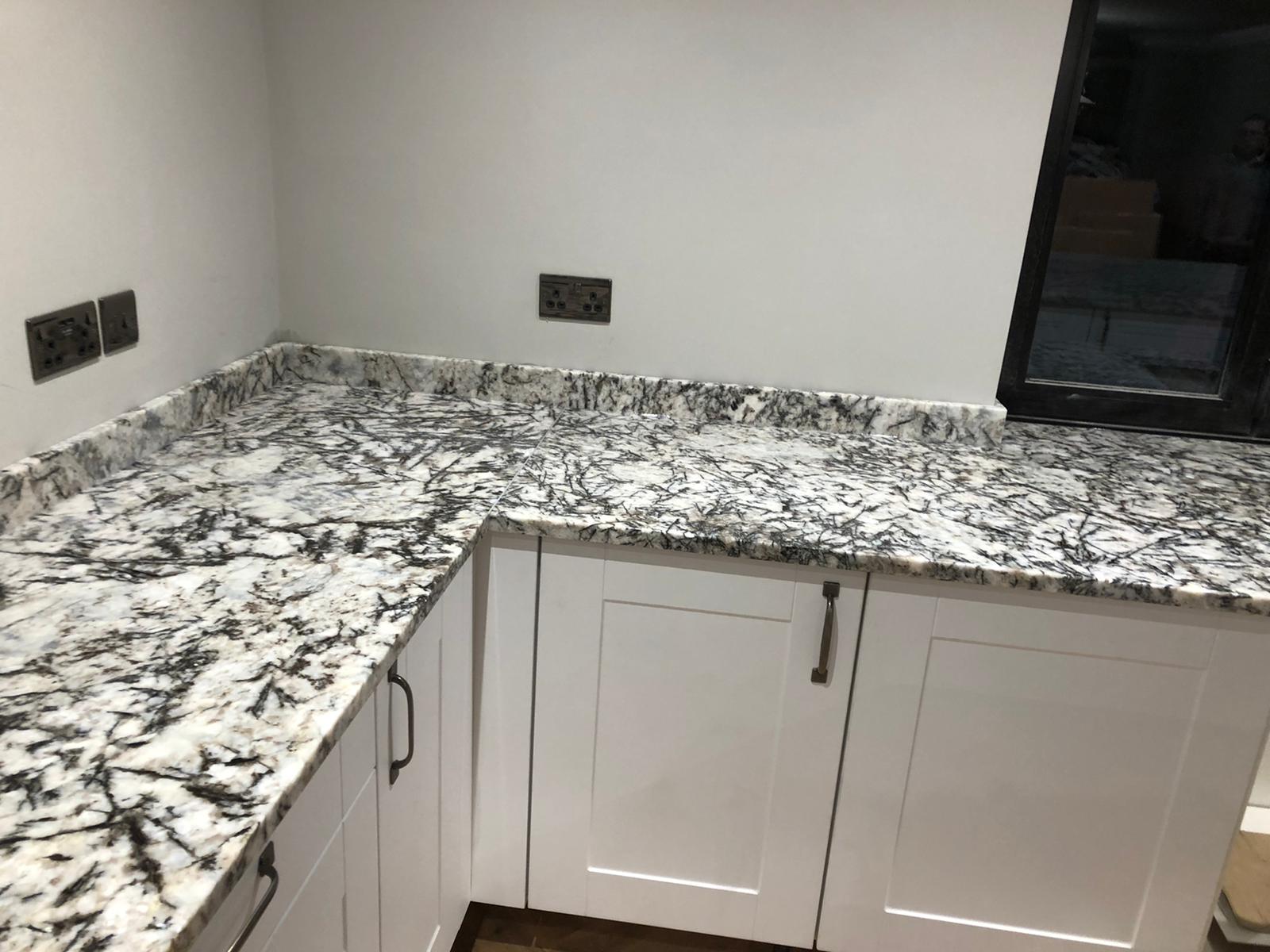 Mm Alaskan White Granite Medusa Stone